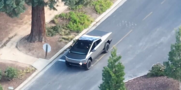 Tesla Cybertruck Unveils Refined Look with Black Tonneau Cover